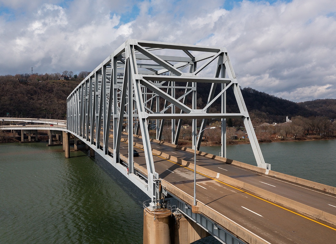 East Liverpool, OH - Suspension Bridge Crossing Ohio River on a Semi Cloudy Day